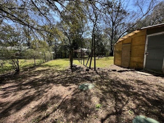 view of yard featuring fence