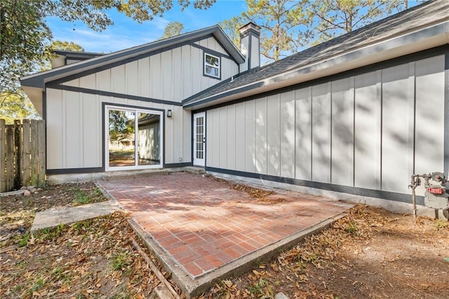 back of property featuring a patio area