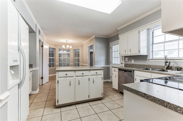 kitchen with pendant lighting, stainless steel dishwasher, white fridge with ice dispenser, light tile patterned flooring, and white cabinetry