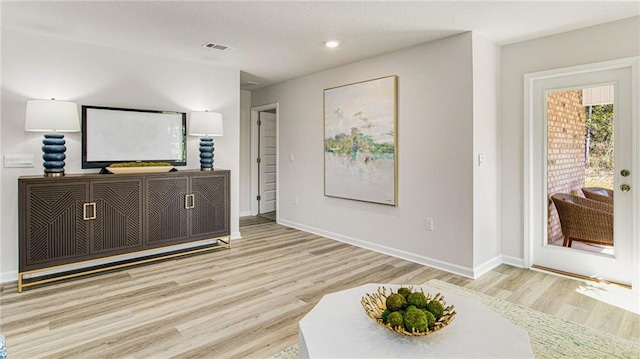 interior space with light hardwood / wood-style floors