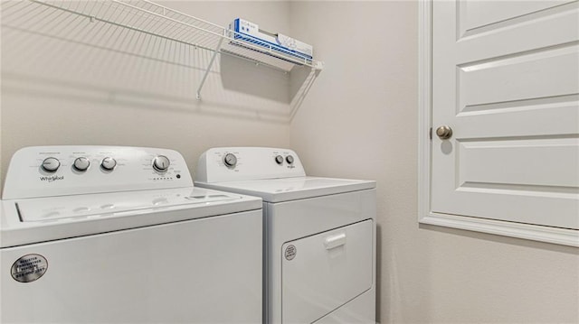 laundry area featuring washing machine and dryer