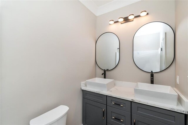 284 Magnolia Dr, Mobile, AL 36617 - bathroom with toilet and double vanity