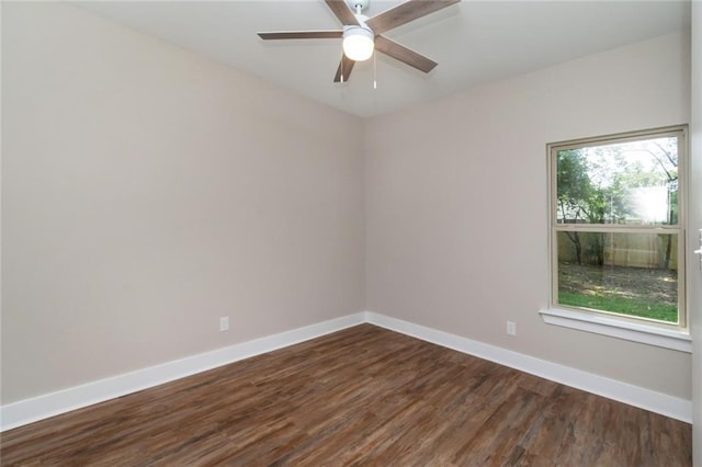 284 Magnolia Dr, Mobile, AL 36617 - spare room featuring dark wood-style floors, baseboards, and a ceiling fan