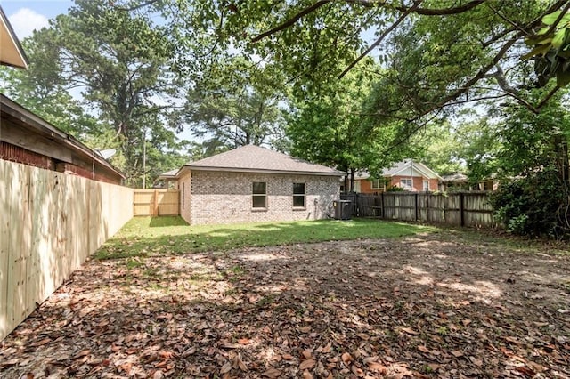 284 Magnolia Dr, Mobile, AL 36617 - back of house featuring brick siding