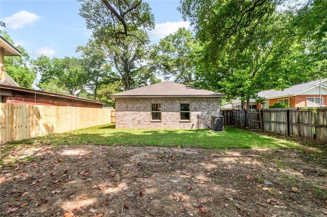 284 Magnolia Dr, Mobile, AL 36617 - rear view of house with brick siding and cooling unit