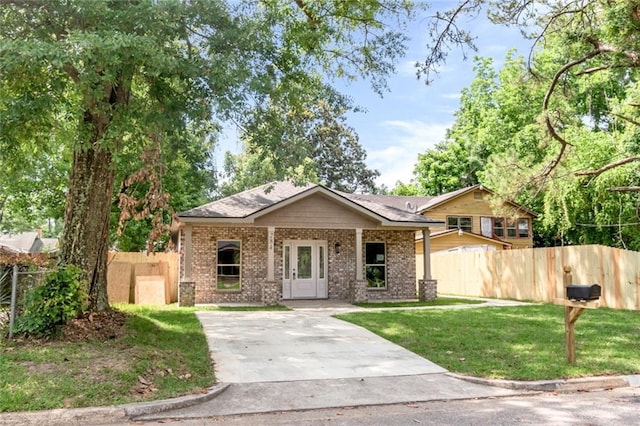 284 Magnolia Dr, Mobile, AL 36617 - view of front facade with brick siding and driveway