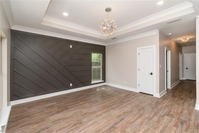284 Magnolia Dr, Mobile, AL 36617 - unfurnished room with a tray ceiling, light wood-style flooring, a chandelier, recessed lighting, and baseboards