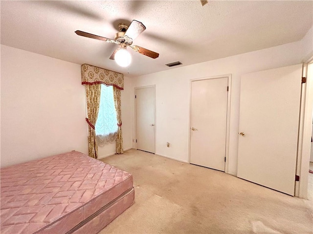 1113 Carre Dr W, Mobile, AL 36618 - bedroom featuring light carpet and ceiling fan