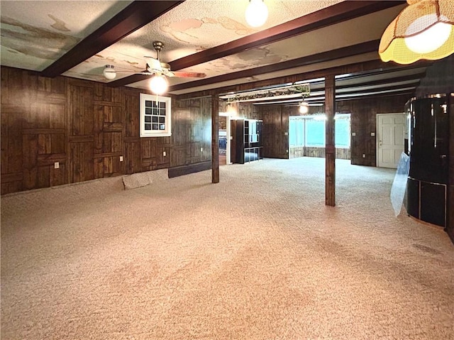 1113 Carre Dr W, Mobile, AL 36618 - basement with wood walls, carpet floors, and ceiling fan