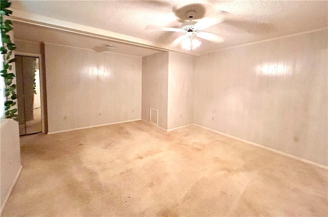 1113 Carre Dr W, Mobile, AL 36618 - spare room with a ceiling fan, a textured ceiling, and carpet
