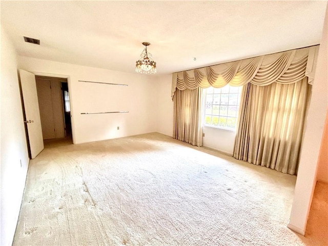 1113 Carre Dr W, Mobile, AL 36618 - carpeted spare room with a chandelier