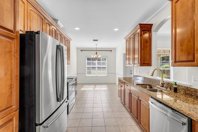 8705 Floyd Crabtree Way, Semmes, AL 36575 - kitchen featuring stainless steel appliances, a chandelier, plenty of natural light, light tile patterned floors, and recessed lighting