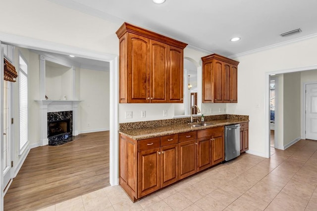 8705 Floyd Crabtree Way, Semmes, AL 36575 - kitchen featuring dishwasher, recessed lighting, ornamental molding, a premium fireplace, and light tile patterned flooring