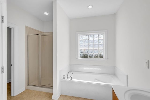 8705 Floyd Crabtree Way, Semmes, AL 36575 - full bath with a bath, a stall shower, tile patterned floors, recessed lighting, and vanity