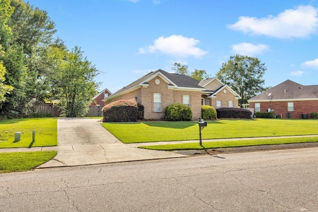 8705 Floyd Crabtree Way, Semmes, AL 36575 - traditional-style home featuring concrete driveway and brick siding