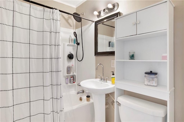 bathroom with ornamental molding, shower / tub combo, and toilet