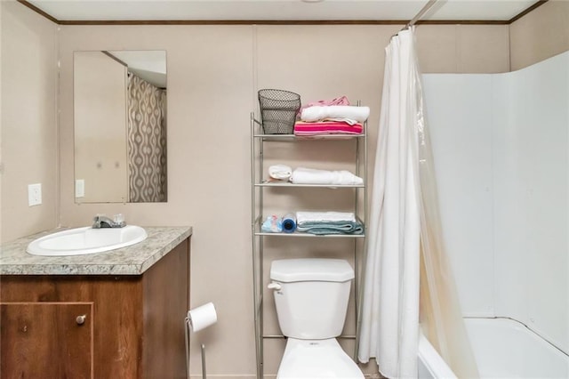 full bathroom with vanity, toilet, and shower / tub combo