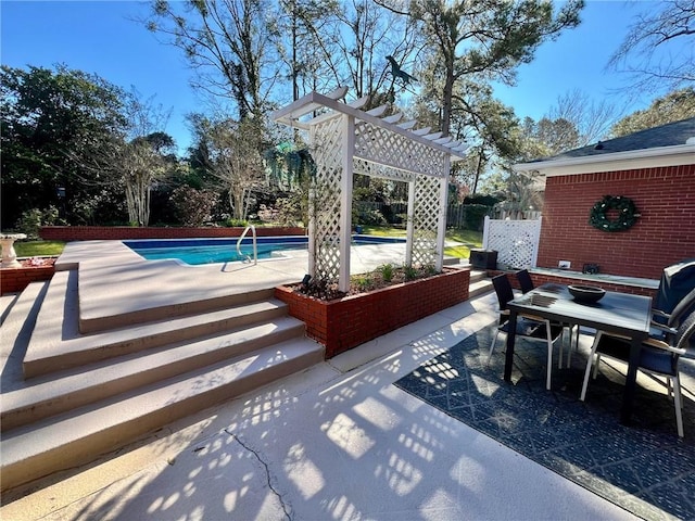 view of patio / terrace with outdoor dining area, an outdoor pool, and a pergola