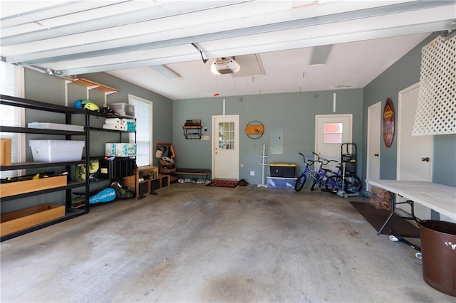 1609 Ridgeland Rd W, Mobile, AL 36695 - garage featuring a garage door opener and electric panel