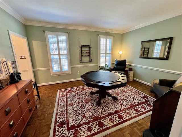 home office featuring crown molding and baseboards