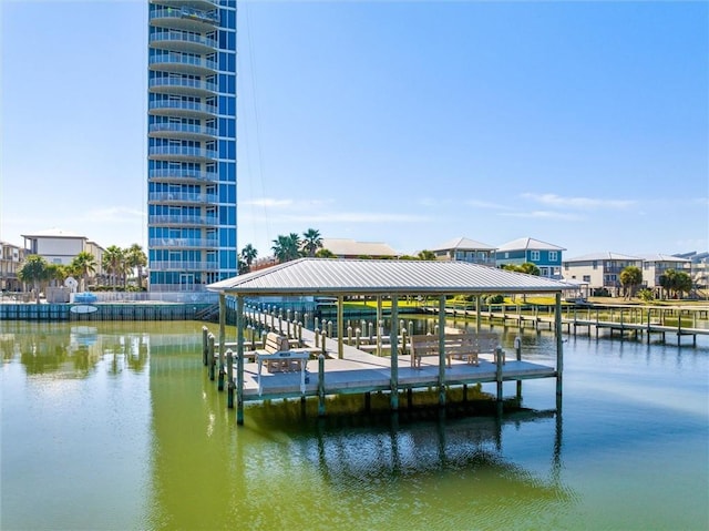 dock area with a water view and a gazebo