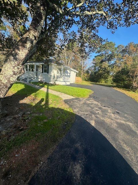 view of front of home with a front yard