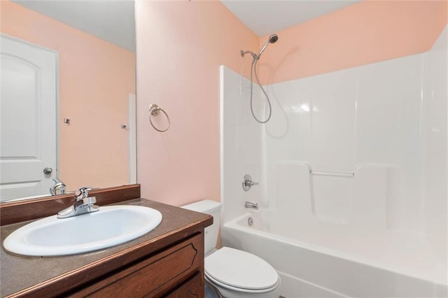 full bathroom with vanity, shower / bathing tub combination, and toilet