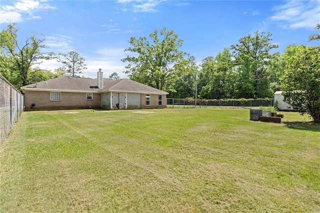 view of yard featuring a fenced backyard