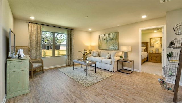 living room featuring light wood-type flooring