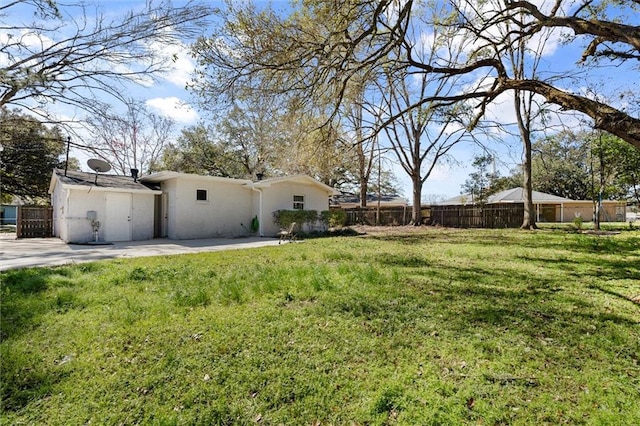 view of yard with a patio and fence