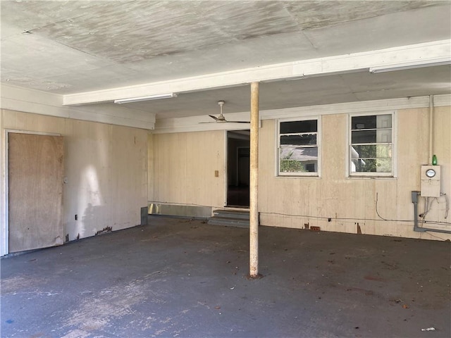 basement with ceiling fan