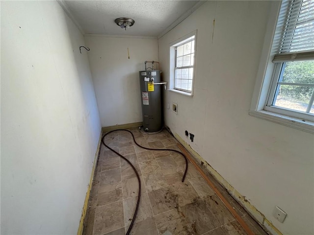 utility room featuring water heater