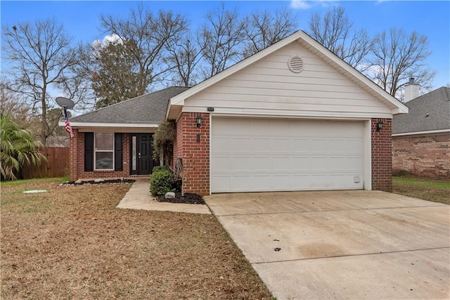 ranch-style home featuring a garage