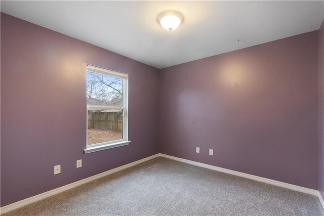 empty room featuring carpet flooring