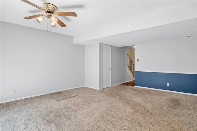 unfurnished room featuring carpet flooring and ceiling fan