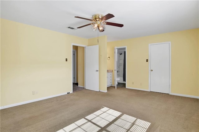 unfurnished room featuring ceiling fan and light colored carpet