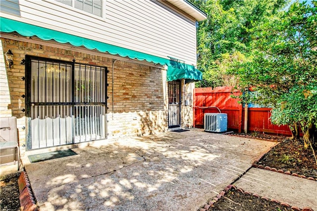 view of patio / terrace featuring cooling unit