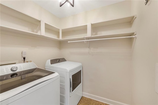 laundry area featuring washer and clothes dryer