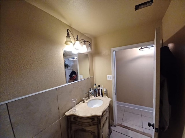 bathroom featuring vanity and tile patterned floors