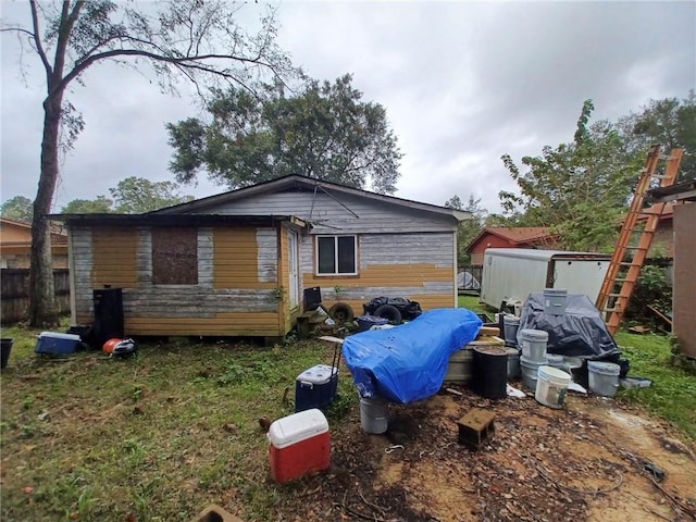 exterior space with a storage shed