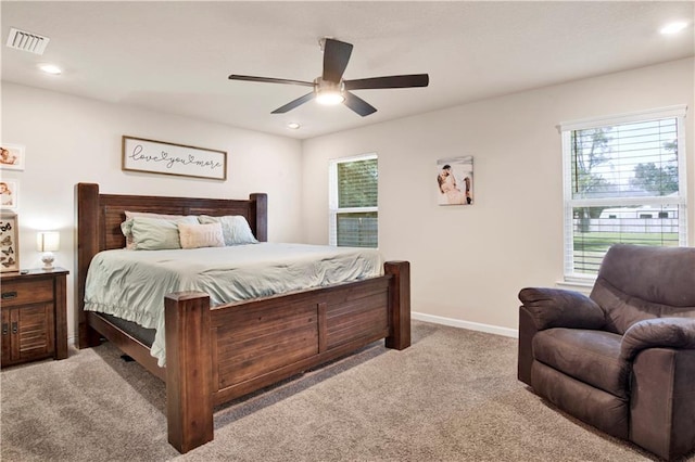 bedroom with recessed lighting, visible vents, light carpet, ceiling fan, and baseboards