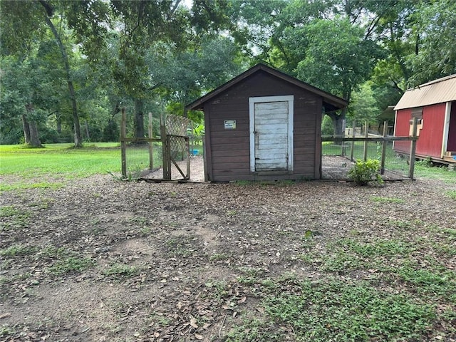 9740 Tanner Williams Rd, Mobile, AL 36608 - view of shed featuring view of wooded area