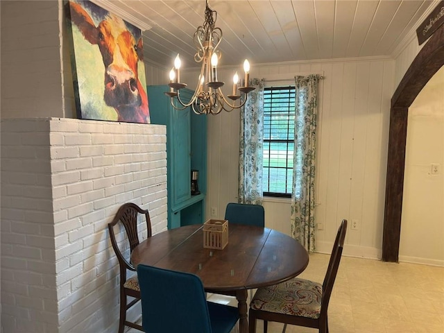 9740 Tanner Williams Rd, Mobile, AL 36608 - dining area with a chandelier, ornamental molding, light flooring, and wooden ceiling