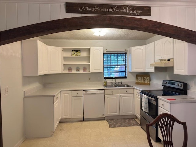 9740 Tanner Williams Rd, Mobile, AL 36608 - kitchen featuring white dishwasher, stainless steel electric range oven, under cabinet range hood, white cabinetry, and light countertops