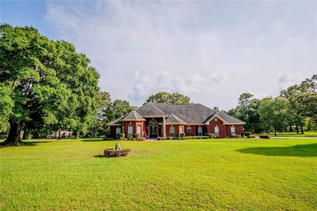 view of front of home with a front lawn