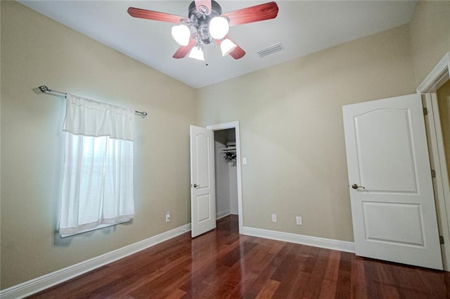 unfurnished bedroom featuring ceiling fan and hardwood / wood-style floors