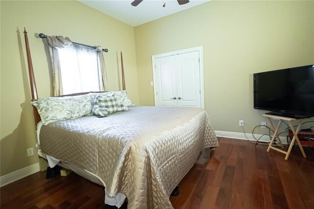 bedroom featuring hardwood / wood-style floors, ceiling fan, and a closet