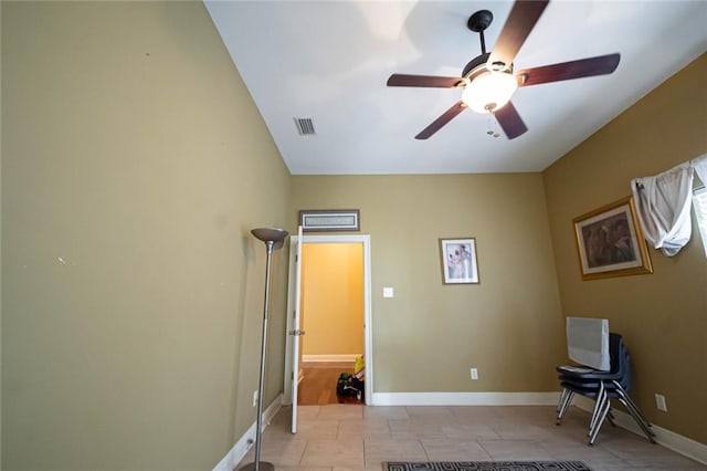 interior space featuring ceiling fan, light wood-type flooring, and a closet