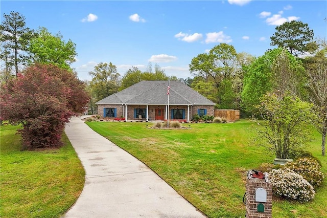 7180 Cannon Ball Cir, Bay Minette, AL 36507 - view of front facade featuring a front yard and concrete driveway