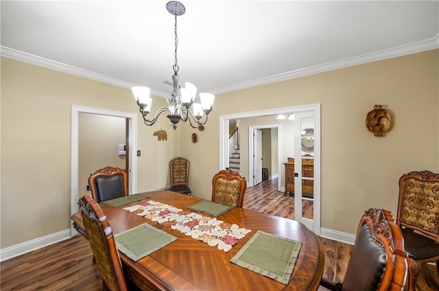 7180 Cannon Ball Cir, Bay Minette, AL 36507 - dining room featuring ornamental molding, dark wood finished floors, and a notable chandelier